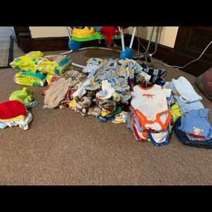 Bundle of baby boy clothes and diapers